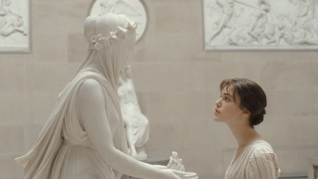 Elizabeth looking at the statue at Pemberley.
